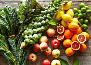 a group of fruits and vegetables on a wood surface Healthy Weight Loss Diets Hickstead